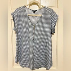 Express Women’s Soft Blue Polkadot Blouse in a size L.